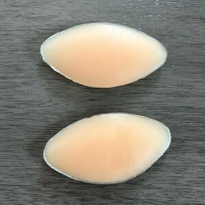 {SHEIN} honey colored silicone bra insert, small subtle lift